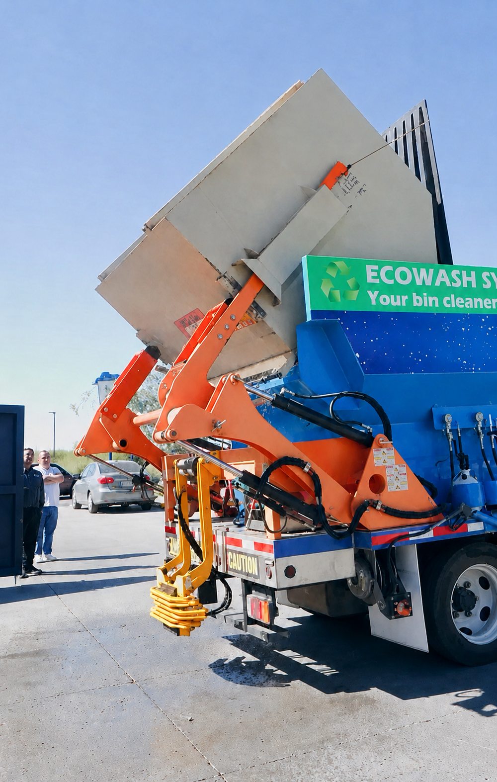EcoWash truck-mounted lift raising a commercial container for cleaning